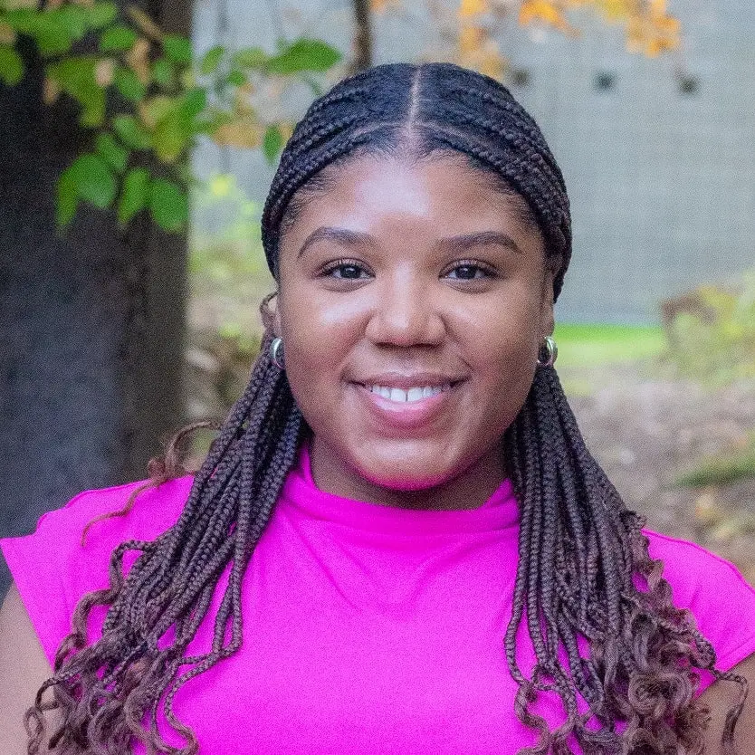 A headshot of Symone Thomas, an outpatient therapist at Community Healing Centers.